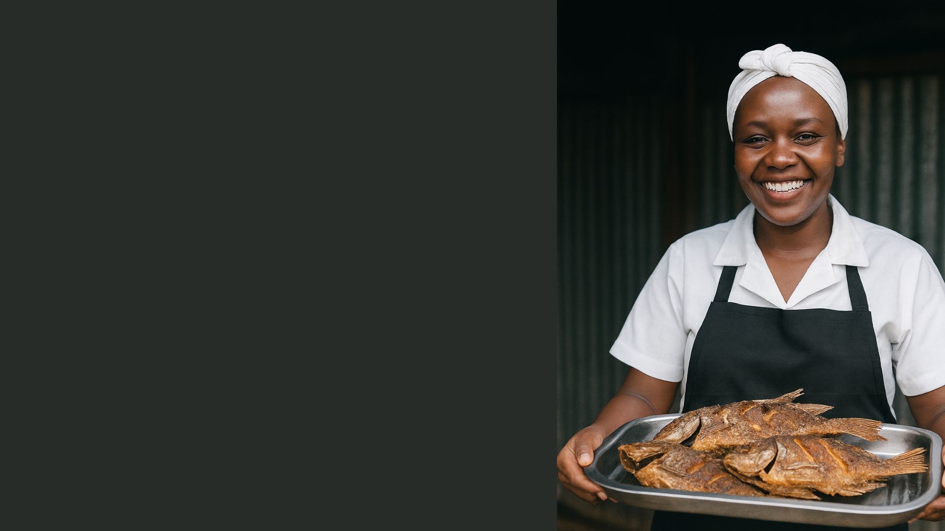 Professional African woman fish vendor holding tray of fried fish